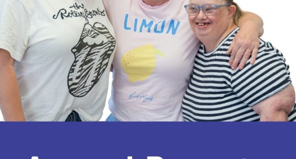 2025-2025 HomePlace Annual Report Cover with two HomePlace participants and a support worker smiling together.